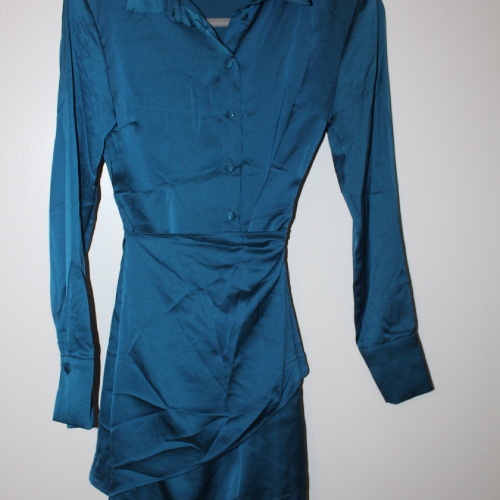 Never worn sateen dress. It has like a belt that you can wrap on your hip